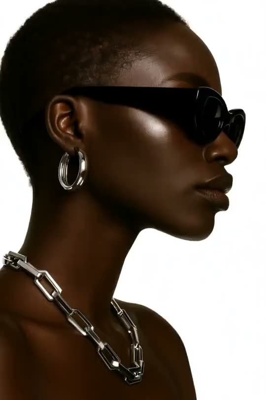 Sculptural silver jewelry portrait