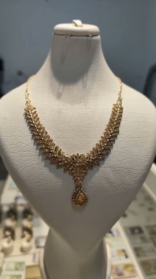 Gold necklace showroom reveal